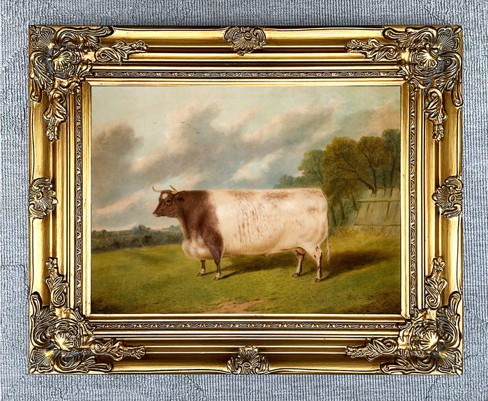 Gilt Framed Oleograph of a Prize Cow in a Rural Landscape