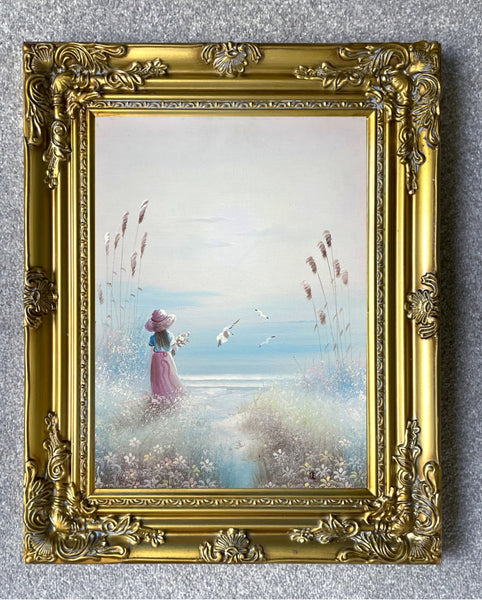 A Fine Vintage Oil on Canvas depicting a Young Girl on a Beach SOLD